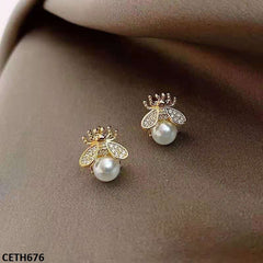 Butterfly pearl earrings